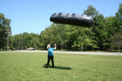 science at play - flying a solar UFO, basically a thin black plastic bag with air inside heated by the sun - it worked impressively well!